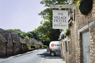 Village hotel and calor truck